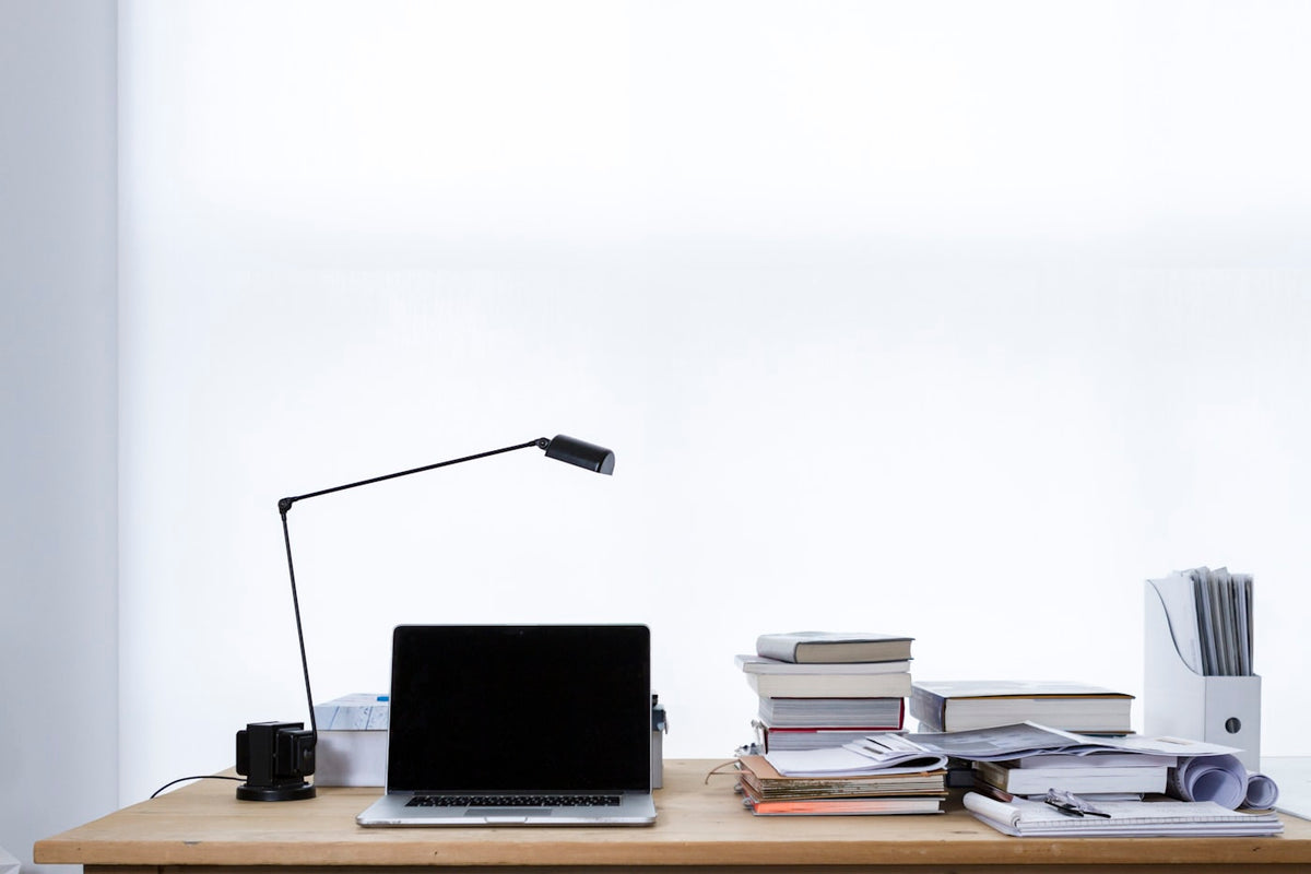 Laptop on a table, representing online telehealth comparison