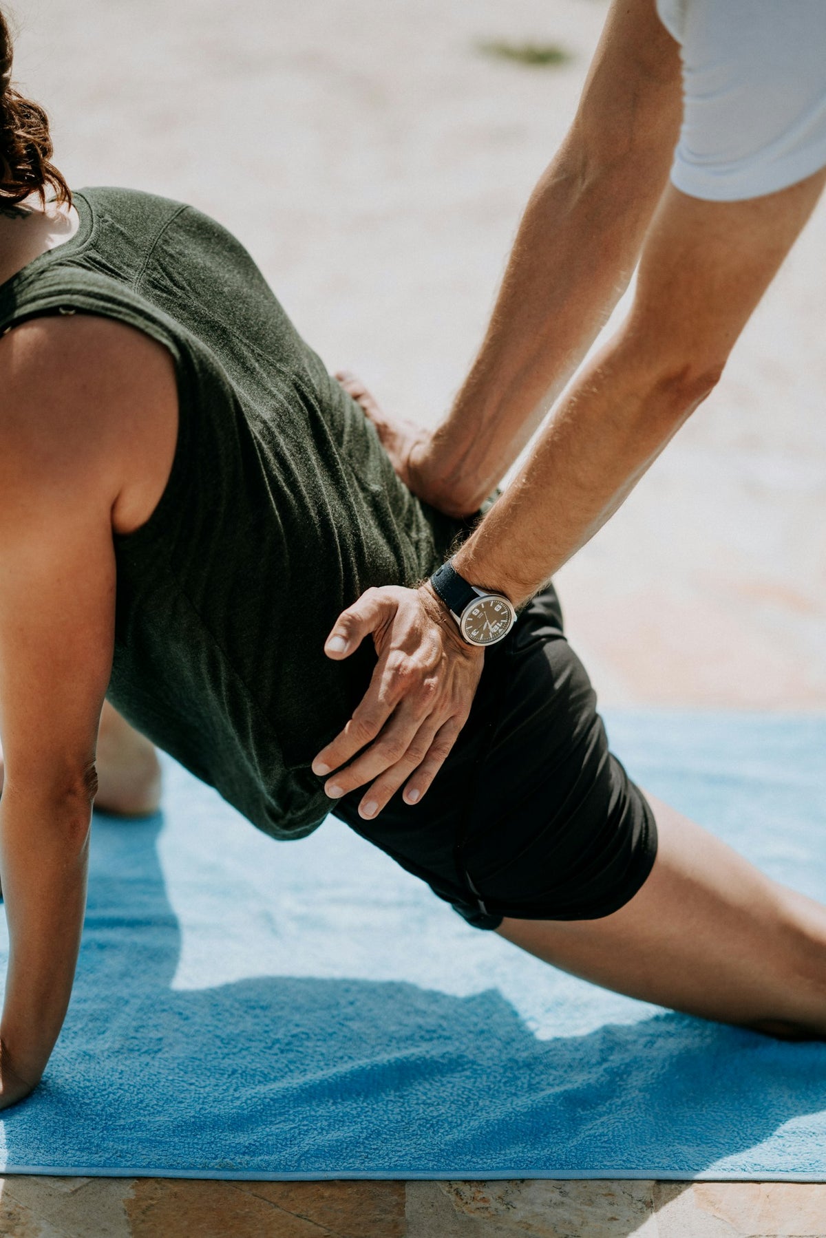Person receiving a massage, representing fitness recovery and wellness