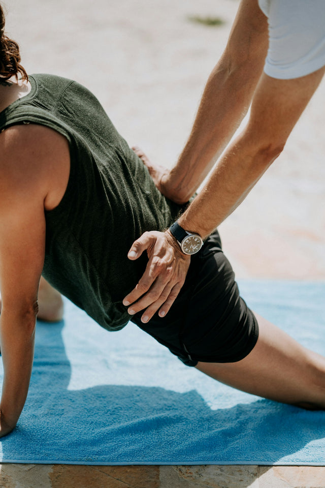 Person receiving a massage, representing fitness recovery and wellness