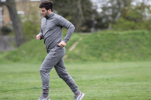 Person running outdoors, representing an active fitness routine