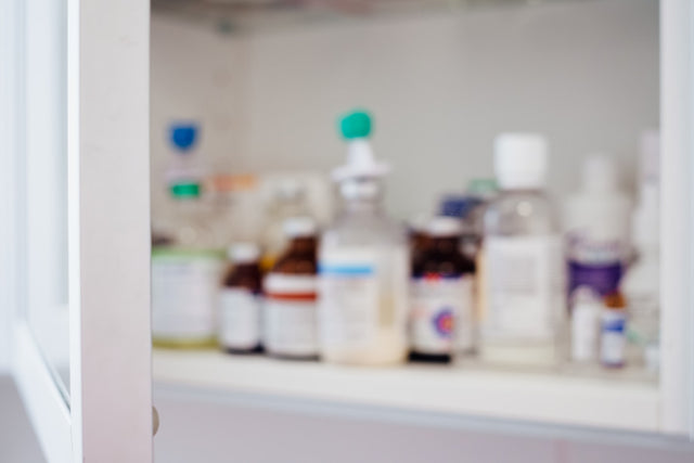 White and red labeled medication bottles