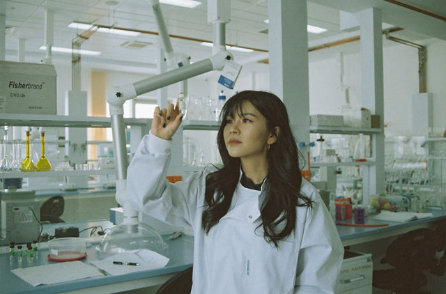 Woman in white medical scrubs