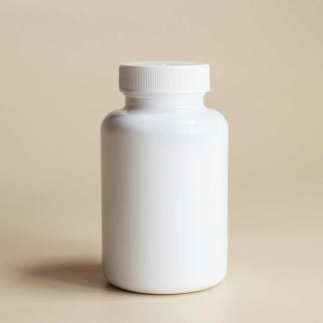 A white plastic medication bottle