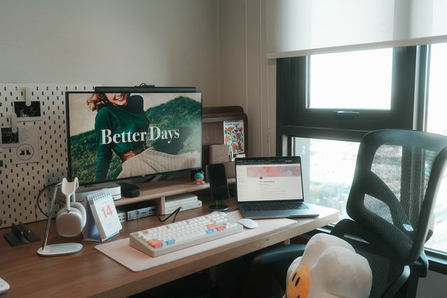 Desk with computer, keyboard, and mouse